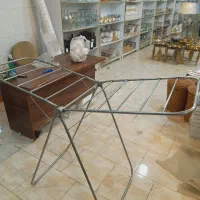 بند رخت فلزی اک|بندرخت و رخت‌آویز|قم, شهرک فاطمیه|دیوار