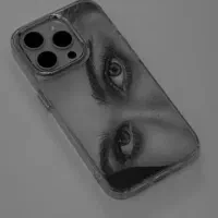 طراحی چشم پشت قاب گوشی و صفحه کتاب هدیه ای خاص|تابلو، نقاشی، عکس|دوگنبدان, |دیوار