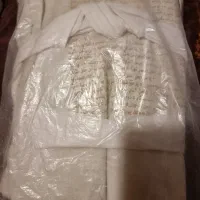 کفن میت. کامل طواف داده شده در حرم سیدالشهدا