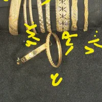 تعدادی طلای نوودرحدنووتعداد۳تاربع سکه و۱نیم سکه