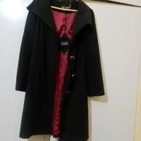 پالتووکاپشن|لباس|اقلید, |دیوار