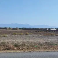 زمین ۶۵۰ متری نزدیک شهر حاشیه جاده اقر۲۰متر برجاده