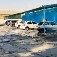 سرایدار و کارگر کارواش