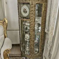 فروشنده وخریدار بوفه میز ساعت برنجی لوازم برنز