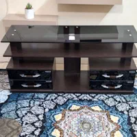 میز تلویزیون چهار کشو شیشه ای. صفحه شیشه ای