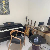 آموزش گیتار الکتریک ،گیتار کلاسیک و هنگدرام