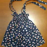 تعدادی لباس و کفش بچگانه|کفش و لباس بچه|بومهن, |دیوار