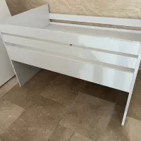 تخت خواب نوزاد کنار مادر