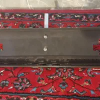 پایه نگهدارنده تلویزیون دیواری