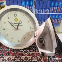 اتو و ساعت دیوار