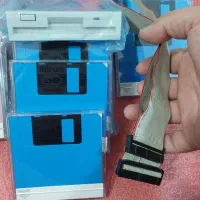 فلاپی درایور همراه کابل و۳ عدد فلاپی پلمپ اکبند