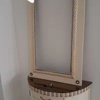 اینه کنسول وساعت ایستاده