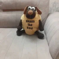 عروسک سگ ناقلا