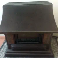 بخاری گازی طرح شومینه،رنگ قهوه ای و مسی