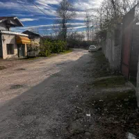 خانه باغی زیبا در مکانی آرام با درختان میوه