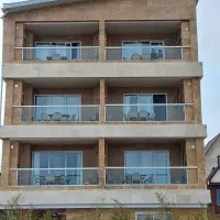 فروش هتل آپارتمان جنب دهکده ویو دریا