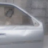 درب پژو ۴۰۵ نقره ی سمت شاگرد
