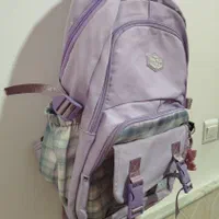 کیف مدرسه نو نو|کیف، کفش، کمربند|قم, چهل درخت‎|دیوار