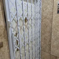 توری حفاظِ پنجره دَرب های آکاردیونی نصب فوری|عمده‌فروشی|مشهد, اقبال|دیوار