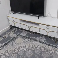 با سلام فروش یک عدد میز تلویزیون در حد نو سالم