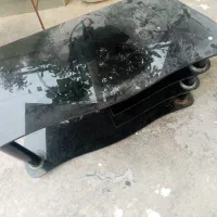 زیر تلویزیون شیشه ای