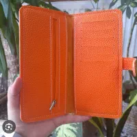 کیف پول چرم نارنجی گم شده