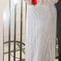 لباس مجلسی سنگ کار شده و منجوق دوزی شده