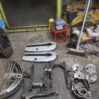 لوازم هوندا 125 اگزوز هوندا کمک عقب هوندا زین