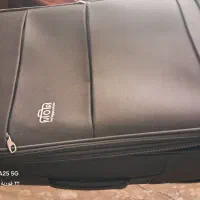 چمدان مشکی قد۶۵ عرض ۴۰وعمق ۳۵