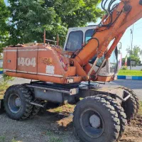 بیل مکانیکی لاستیکی اطلس ۱۴۰۴