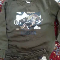 کاپشن|کفش و لباس بچه|بومهن, |دیوار