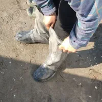 کفش چکمه ای ضد آب. بند تنظیم از پشت