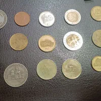تعدادی سکه خارجی و ایرانی کلکسیونی