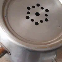 کتری رو گاز