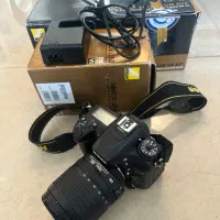 دوربین نیکون D7200 + لنز 105-18 f3.5