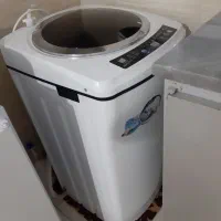 یخچال امرسان و ماشین لباسشویی ومیز نهار خوری