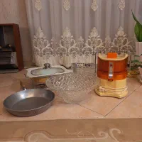 آبمیوه گیری توشیبا و تابه چدن روسی و ظروف کریستال