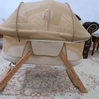سیسمونی نوزاد (تخت،پشه بند،آغوشی)