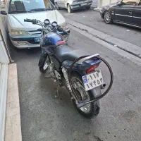 پولسار آبی دو شمع