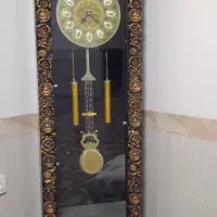 آیینه و کنسول و ساعت