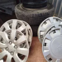 رینگ فولادی و لاستیک سایز 14با قالپاق نو نو|قطعات یدکی و لوازم جانبی|فارسان, |دیوار