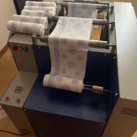 دستگاه رول کن سفره یکبار مصرف سه کاره