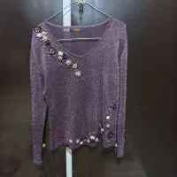تعداد زیادی لباس درحدنو