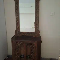 جاکفشی با آینه