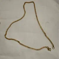 زنجیر کارتیر مردانه در حد نو ۵۰۰ بالای تابلو