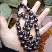 تسبیح کهربا رگه پیچ بنفش دودی