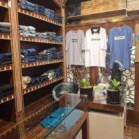 فروش بوتیک مردانه رگال قفسه لباس آیینه دکورمانکن