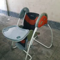 صندلی غذاو تاب برقی کودک در حد نو