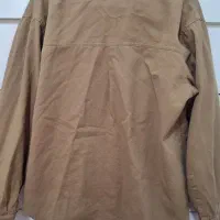 تعدادی لباس|لباس|رشت, ولکس|دیوار