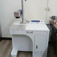 دستگاه لیزر حکاکی و برش فایبر